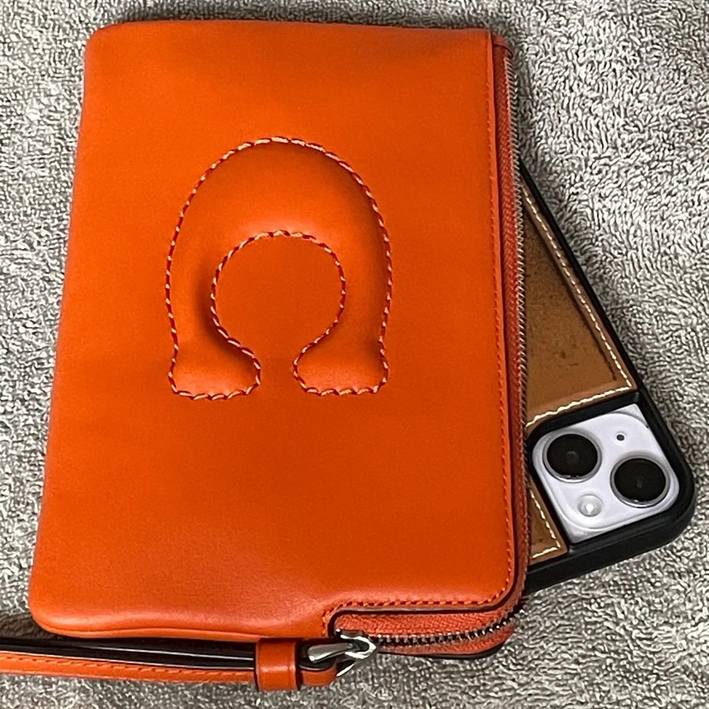 COACH Debossed Sculpted C Smooth Leather Large Corner Zip Wristlet inDark Orange